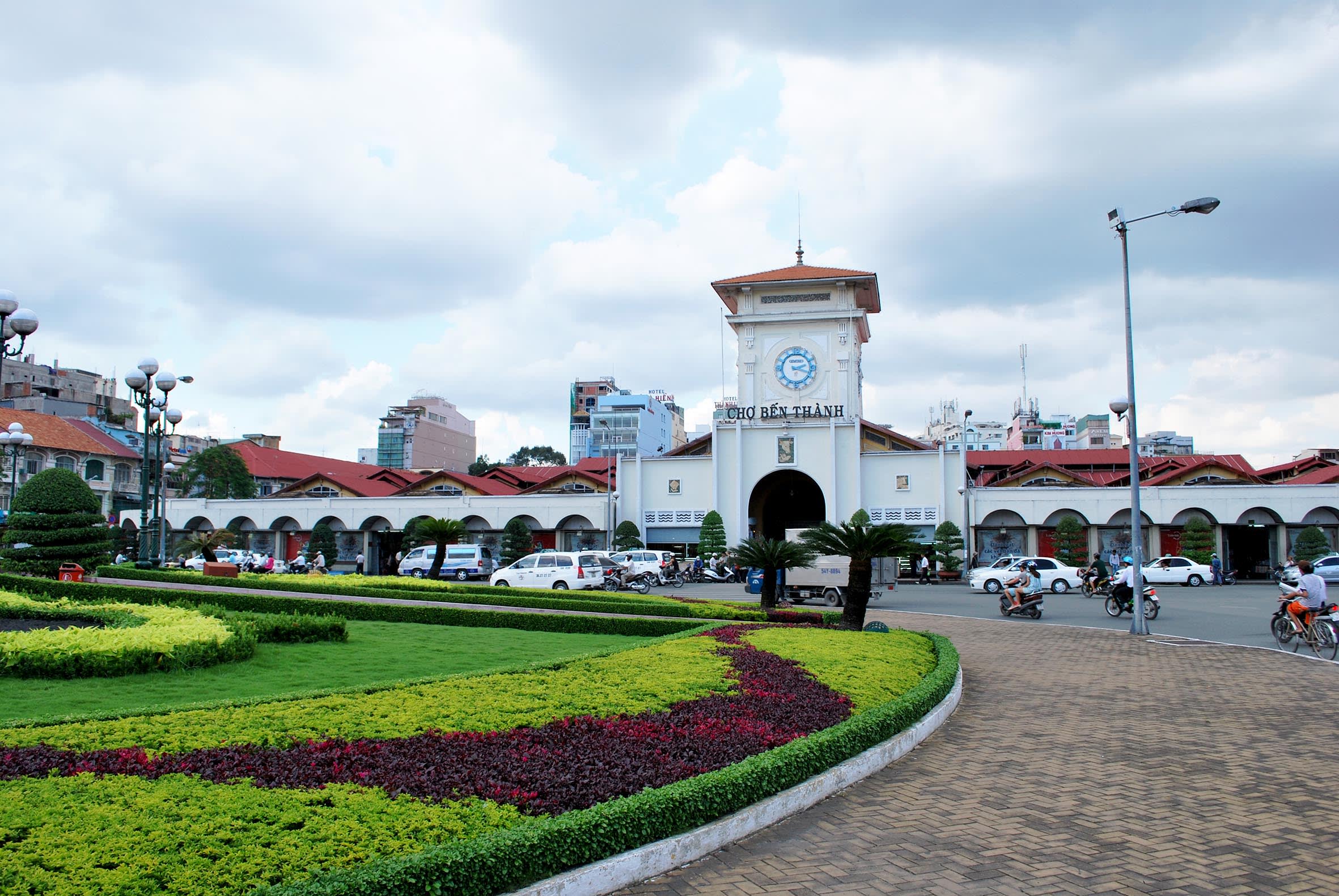 a group of people around a track