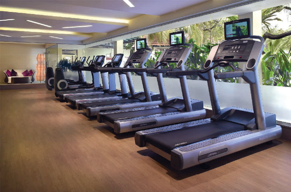 a row of wooden benches sitting on top of a table