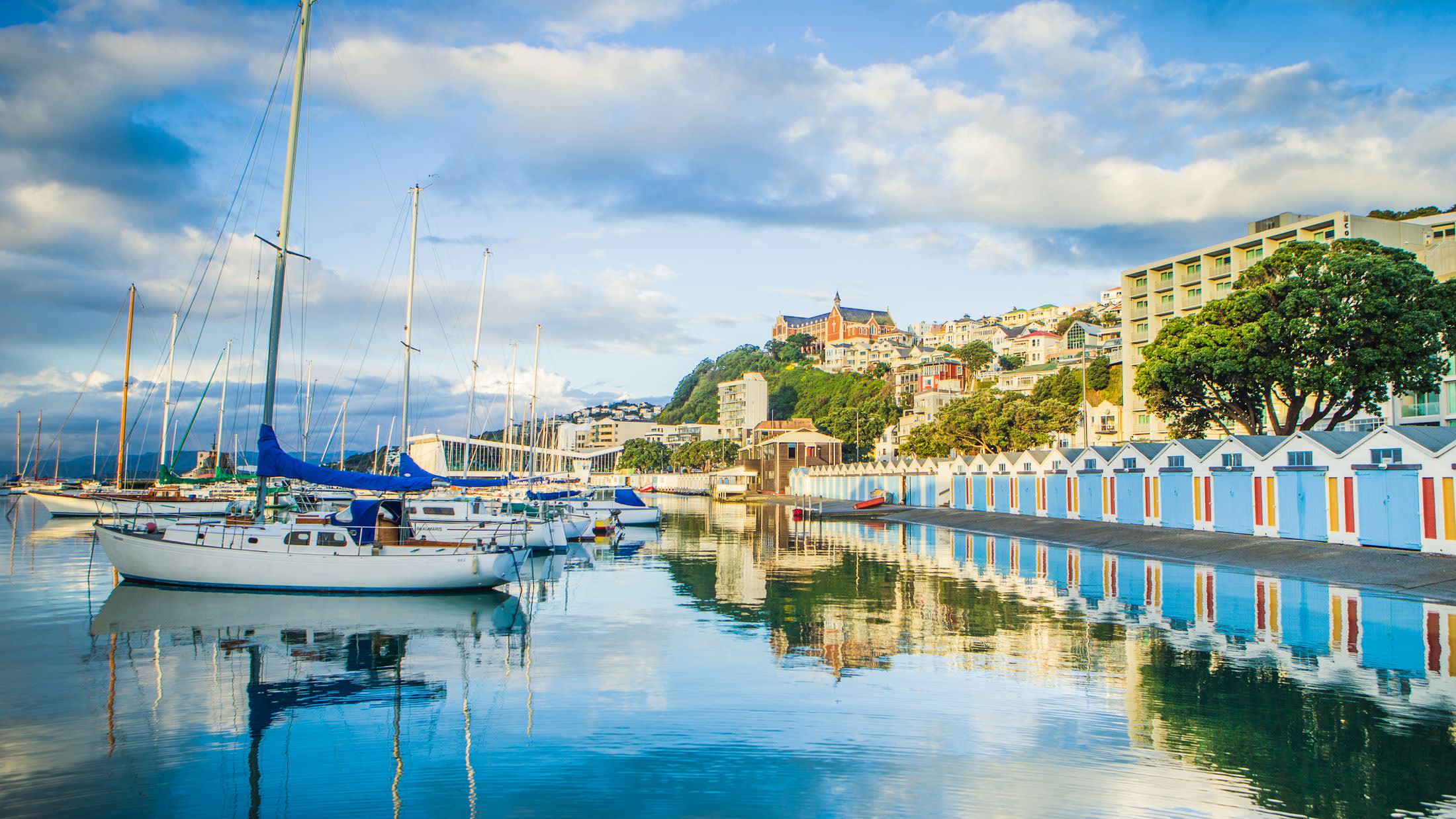 a boat is docked next to a body of water