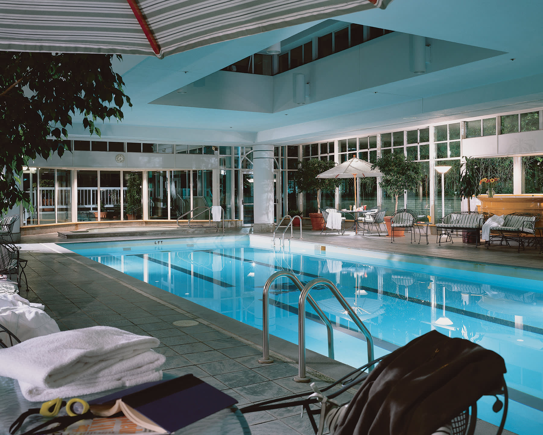 a chair sitting in front of a pool