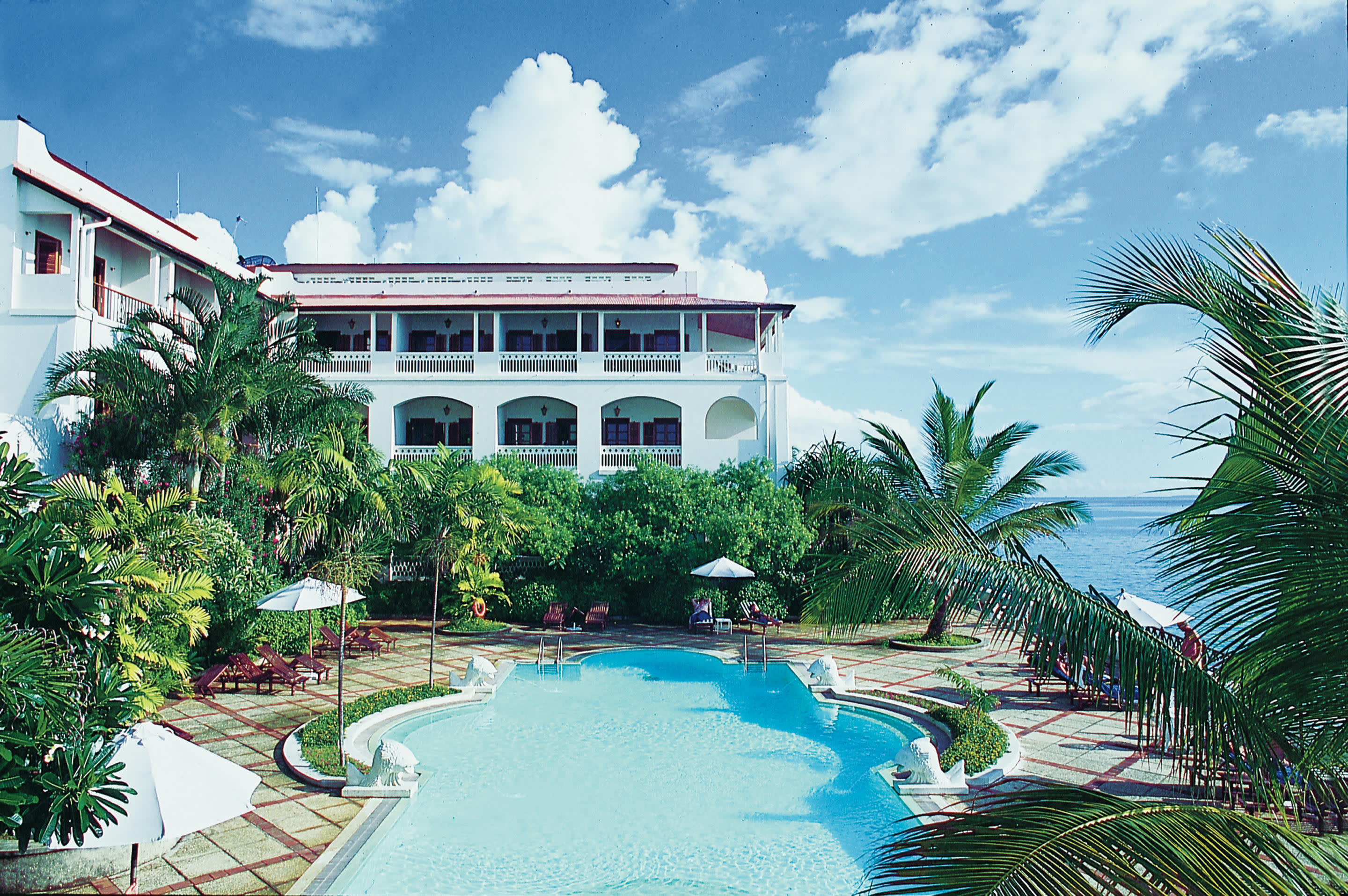 a large pool of water in front of a building
