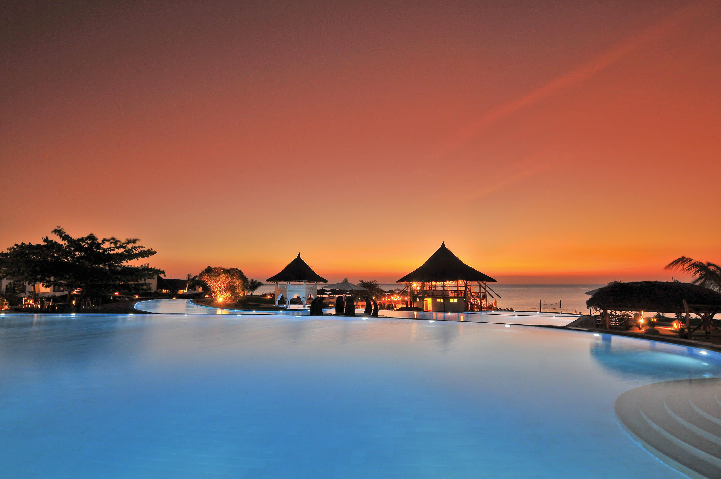 a sunset over a body of water