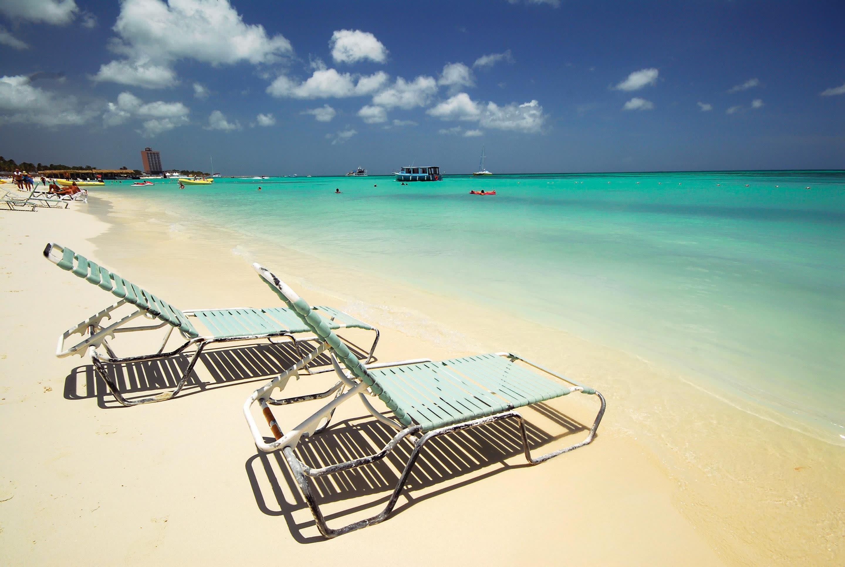 a boat sitting on top of a beach