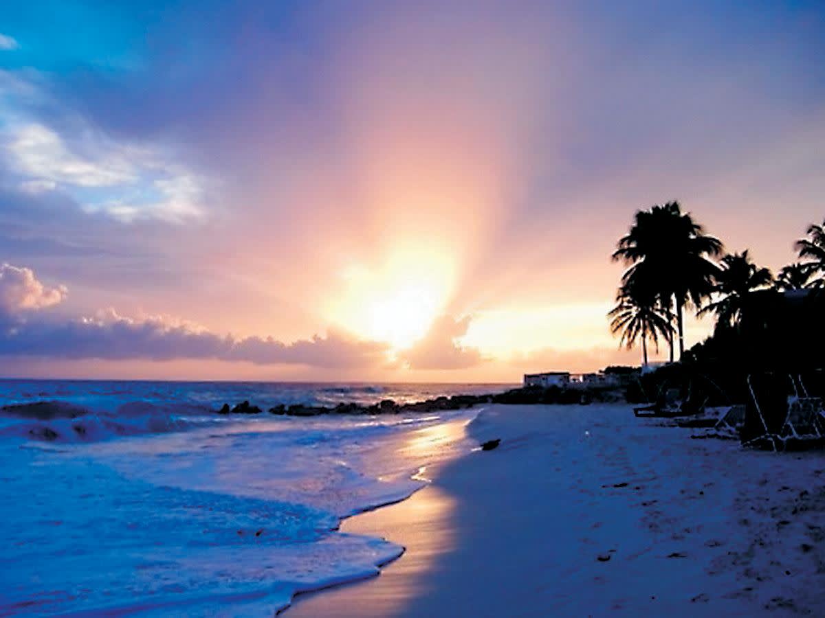 a sunset over a body of water