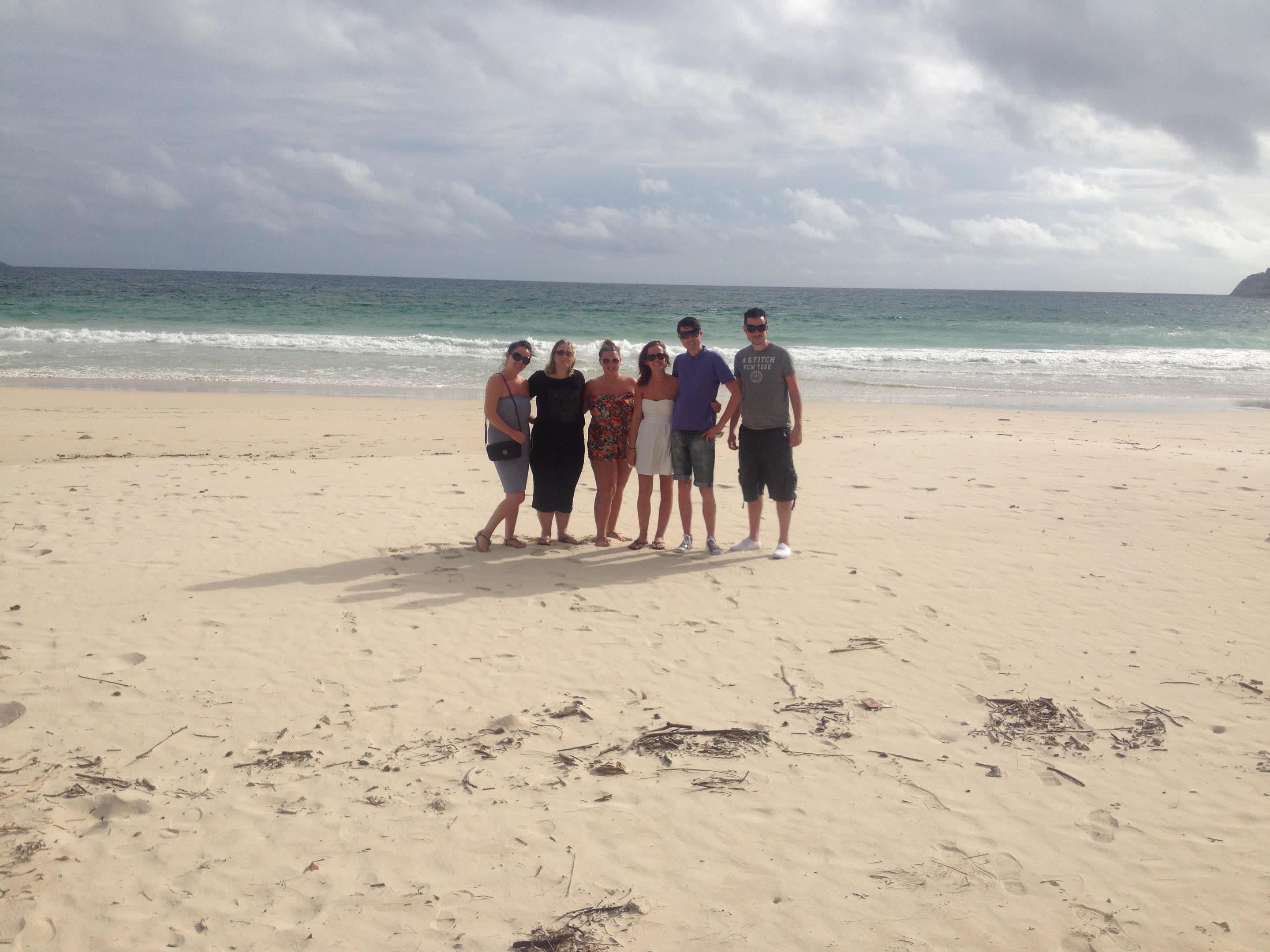 a group of people on a beach