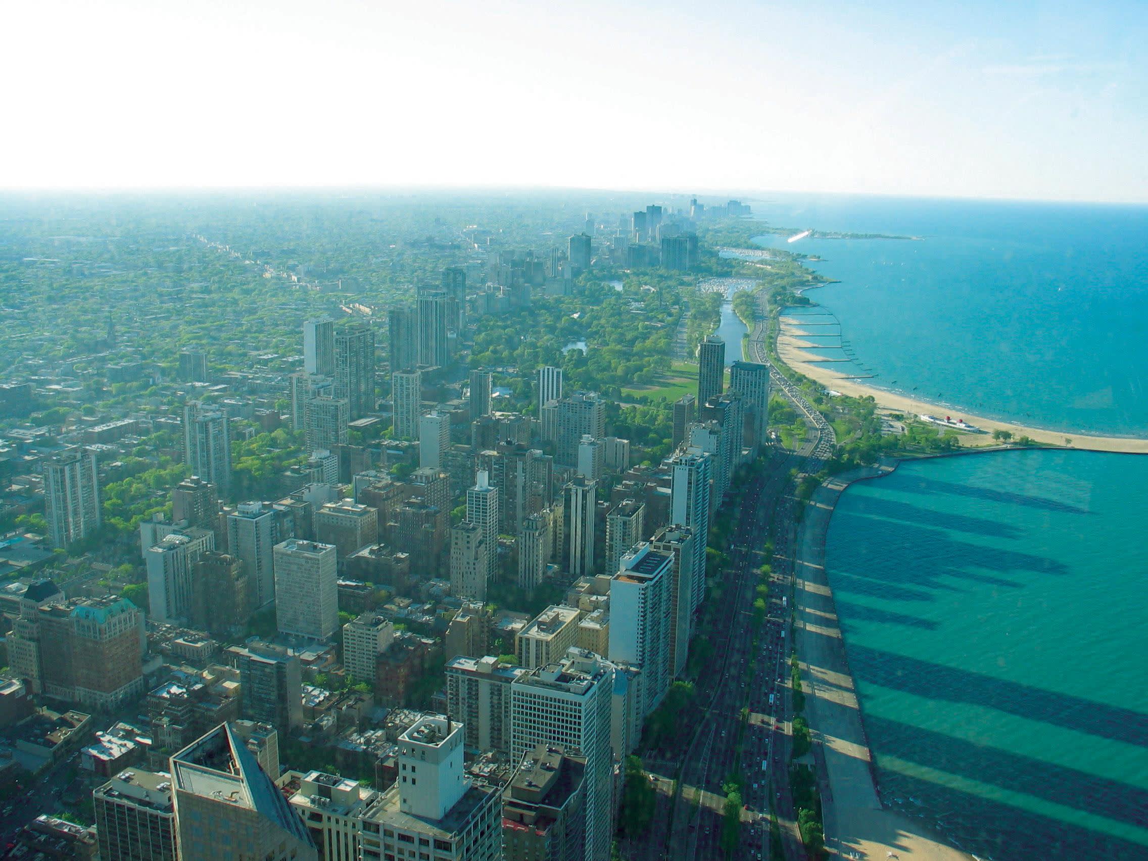 a view of a large body of water with a city in the background