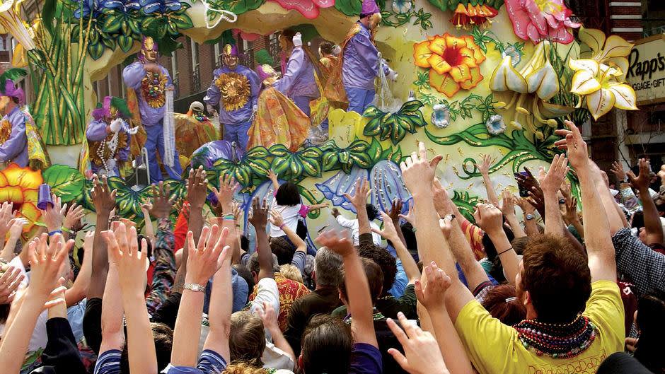 a group of people around each other