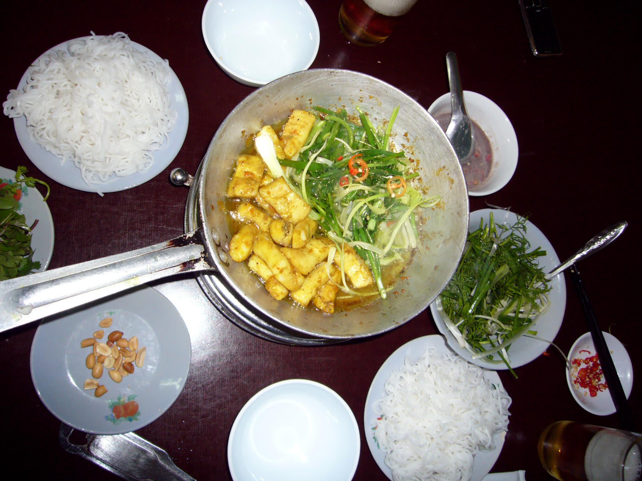 a bowl of food on a plate on a table