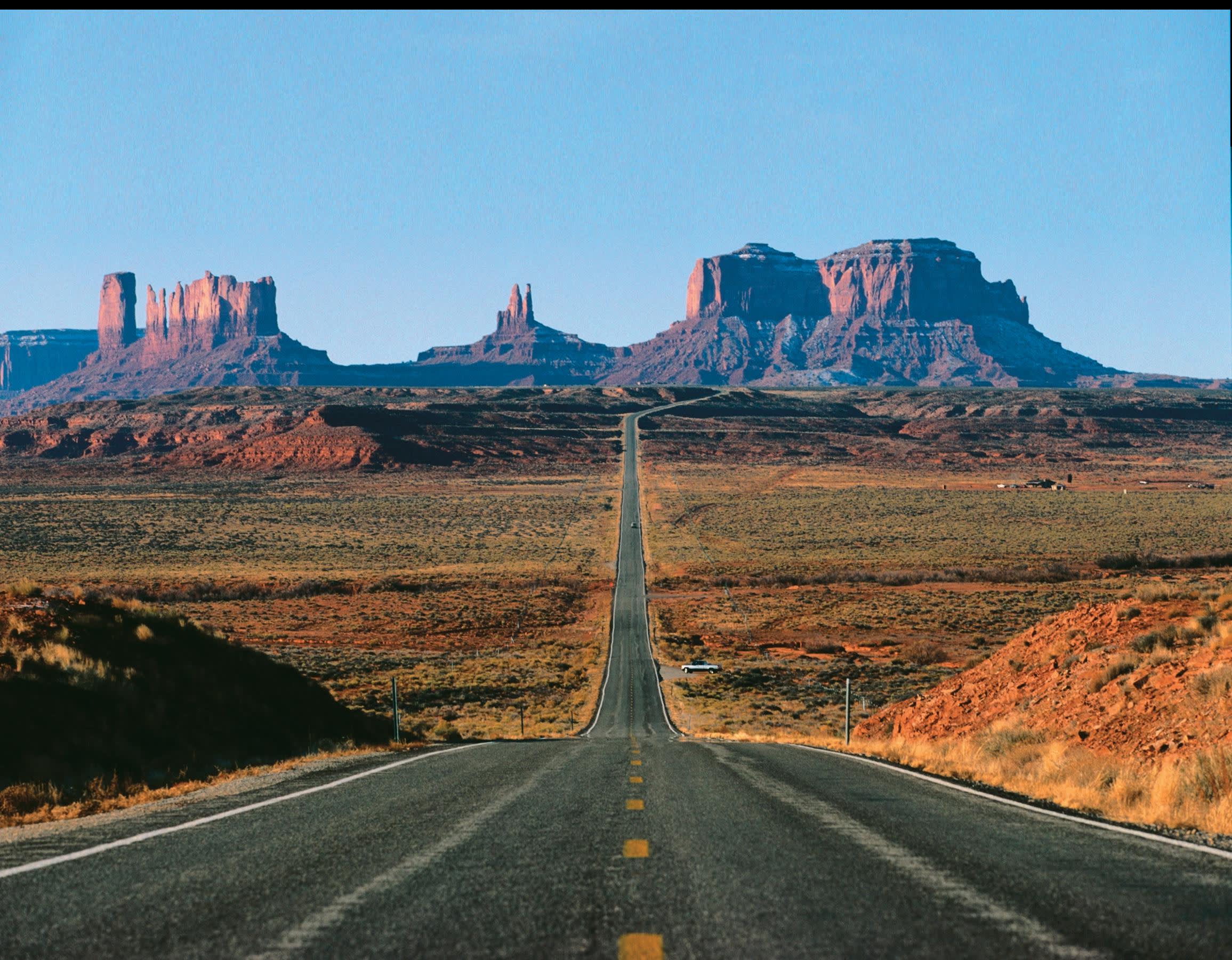 a train is on the side of a mountain