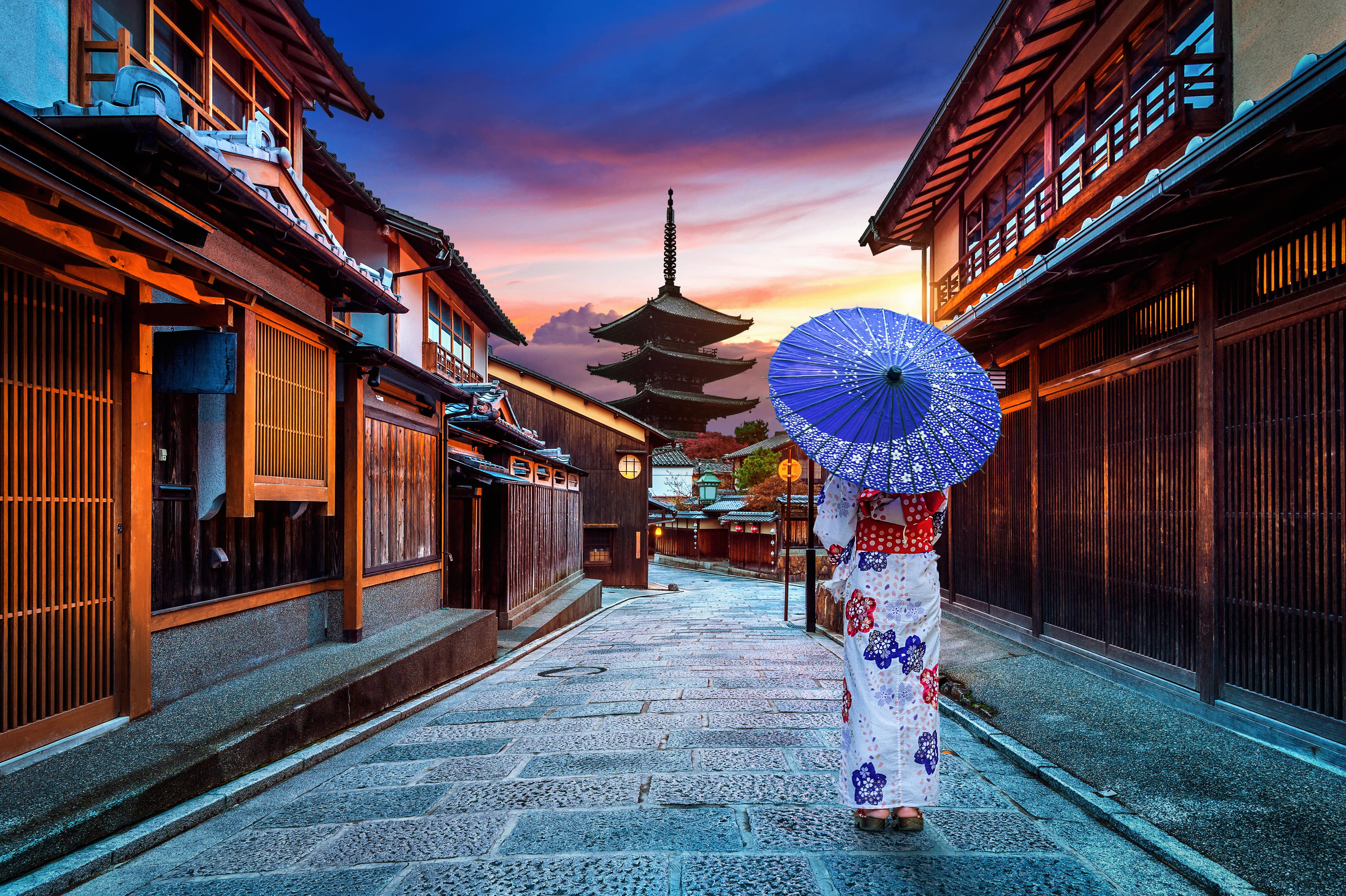 Asian woman wearing japanese traditional kimono at Yasaka Pagoda and Sannen Zaka Street in Kyoto, Japan