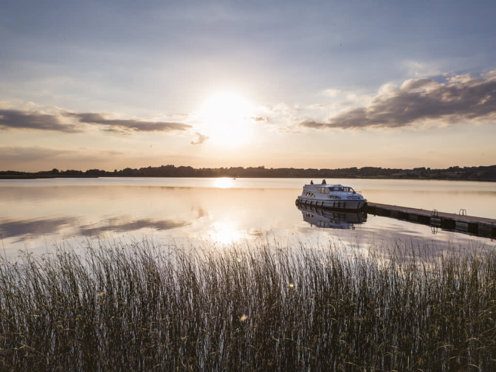 Le Boat cruiser moored at sunset on the River Shannon in Ireland