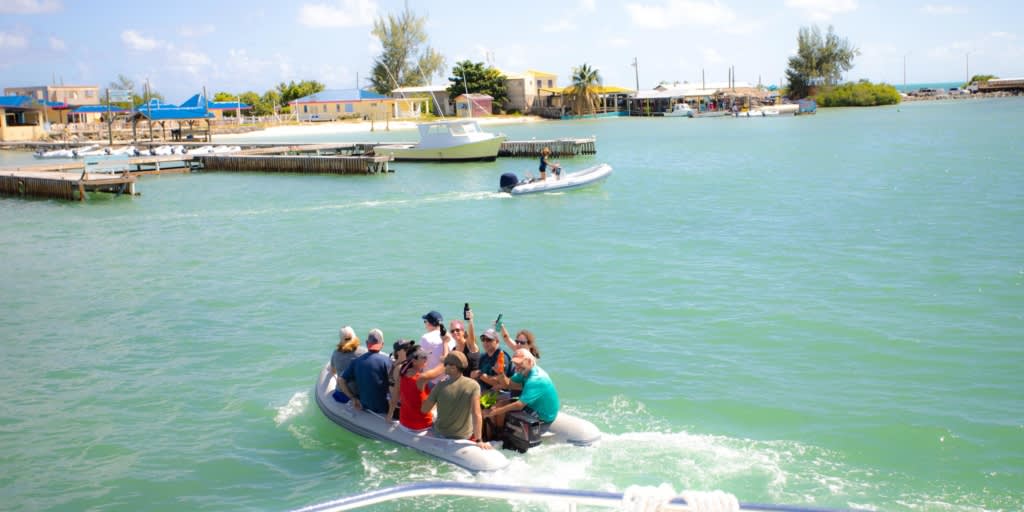 Charter guests taking the dinghy over to the island of Anegada