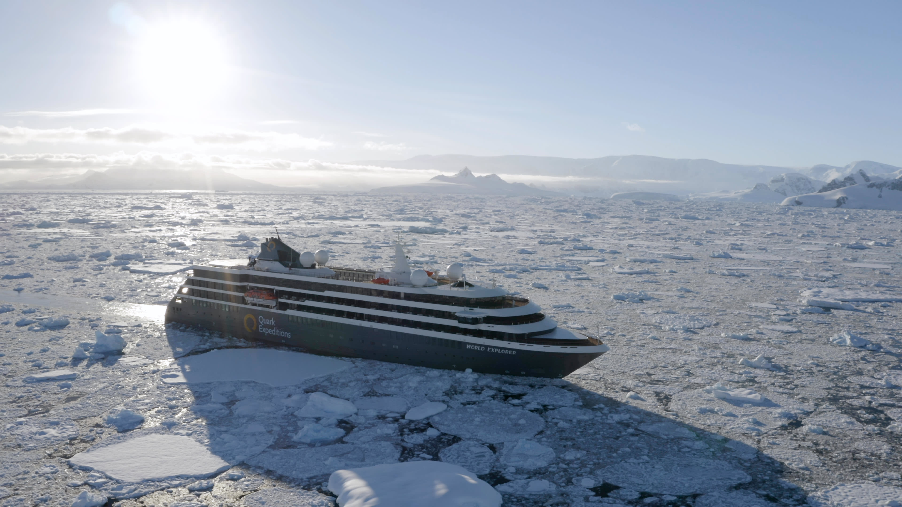 World Explorer cruising through sea ice in the Antarctic Peninsula.