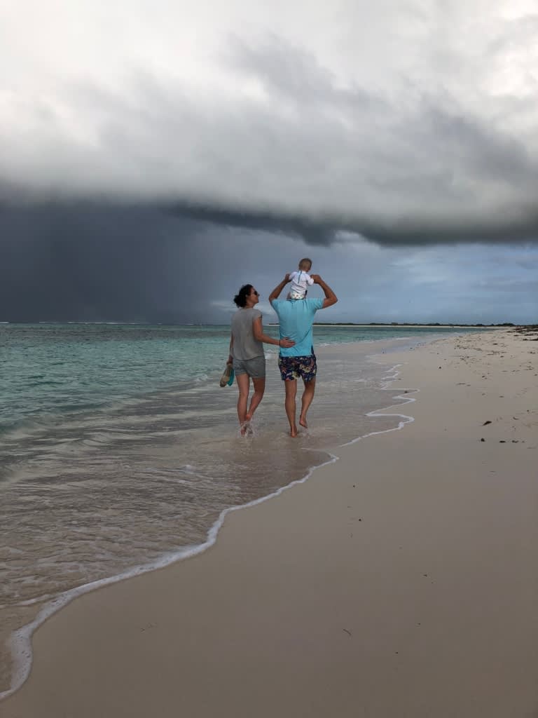 family walking on beach