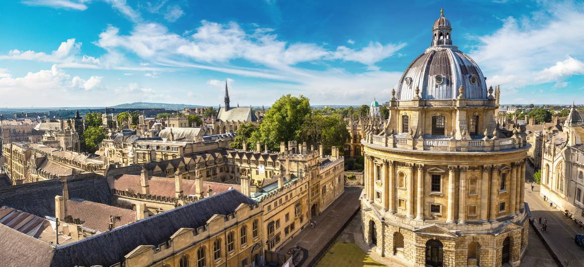 Aerial view of Oxford’s cityscape with cathedral towers, a historic university city near the Thames in Oxfordshire.