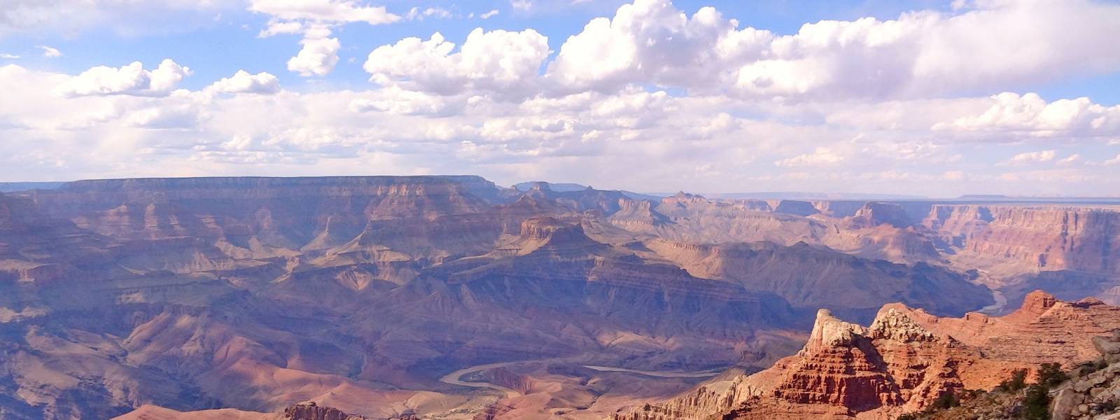 a canyon with a mountain in the background
