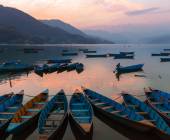 Boats on Phewa Lake at Sunset