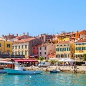 Colorful Rovinj in Istria with boats in the port, Croatia
