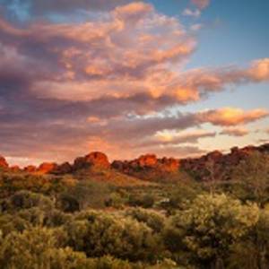 Enchanting Travels Australia Tours Rock formations surrounding the Kings Canyon car park at sunset