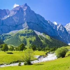 Enchanting Travels Germany Tours panorama landscape Ahornboden with alps mountains Karwendel in Bavaria, Germany