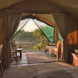 Luxury guest tent at Rekero Tented Camp Hotel in Masai Mara, Kenya
