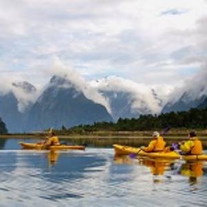 Enchanting Travels New Zealand Tours sea kayak in Milford Sound, New Zealand