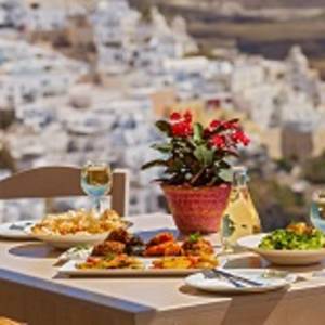 Romantic dinner with views of the mountains, Greece, Santorini