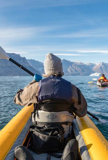 Guests enjoying the paddle excursion in Greenland. Photo by Acacia Johnson.