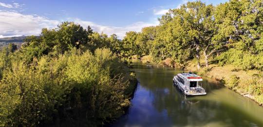 Aerial view of a Liberty boat on the Canal du Midi