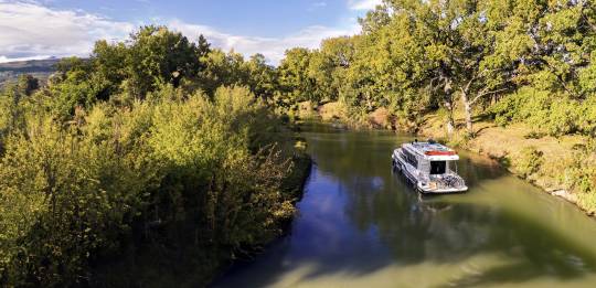 Aerial view of a Liberty boat on the Canal du Midi
