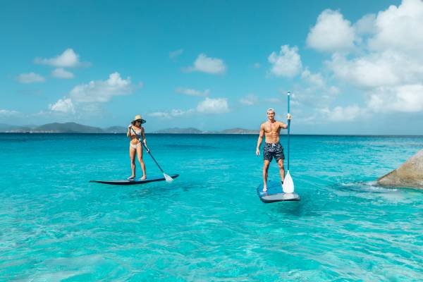 Couple paddleboarding in the BVI
