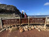 A couple standing at the Cape of Good Hope