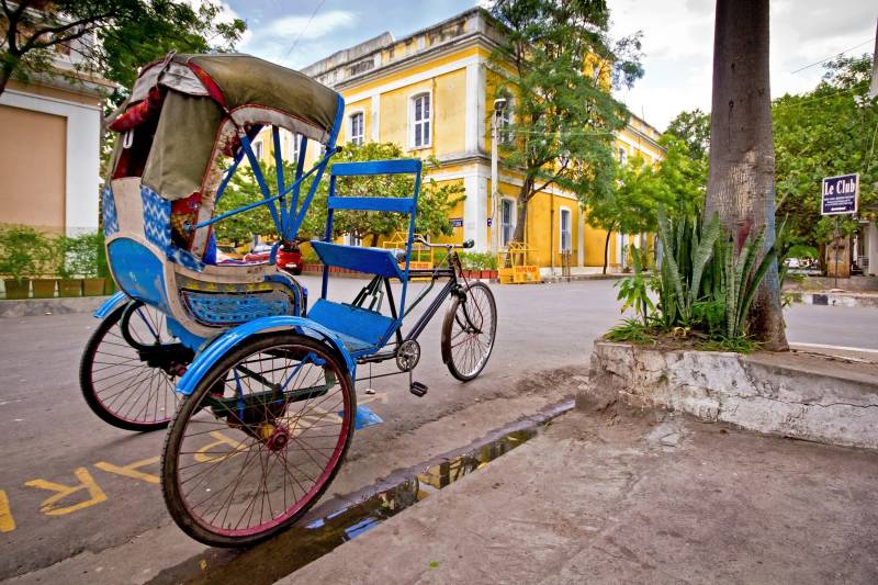 A vintage tricycle carriage used to transport people around the city of Pondicherry, Enchanting Travels