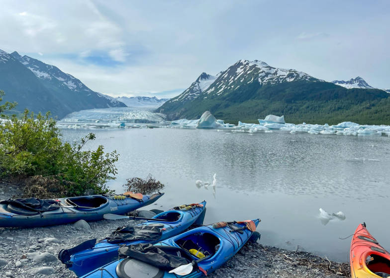 A waterbody with a mountain backdrop in Alaska