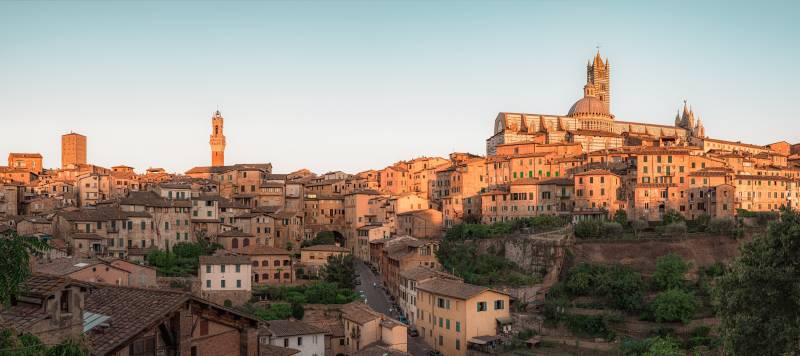 Enchanting Travels Italy Tours Panorama of Siena, cityscape, a beautiful medieval town in Tuscany