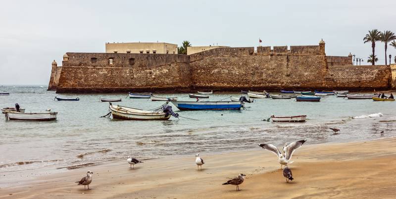 Enchanting Travels Spain Tours Kadiz beach, San Sebastian fortress, Spain