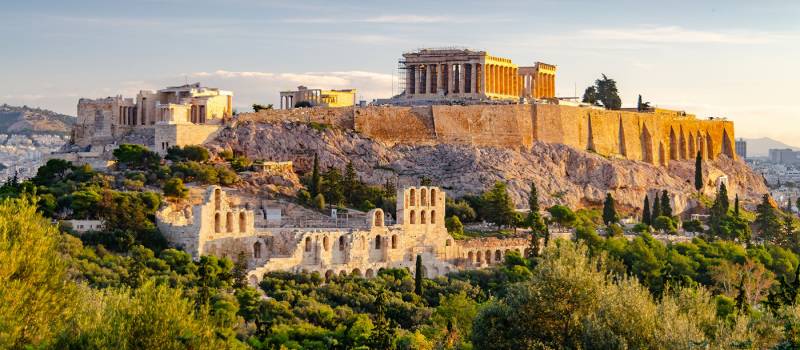 Famous Athens landmark Acropolis and the Odeon of Herodes Atticus, Herodeion, just after the sunrise.
