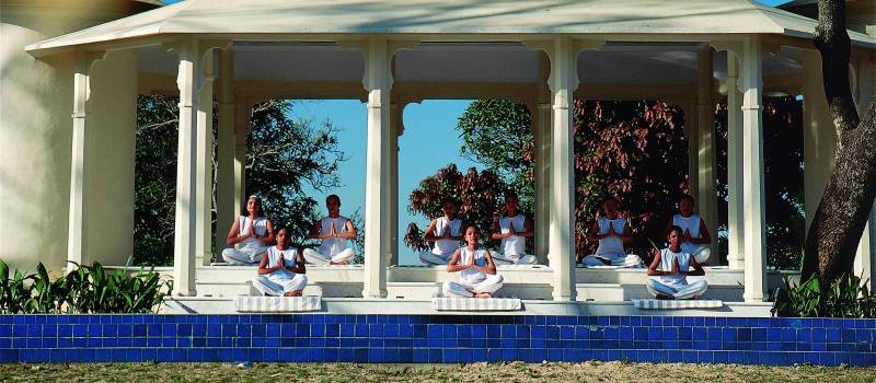 Outdoor group yoga at Ananda Spa in Rishikesh, The Himalayas