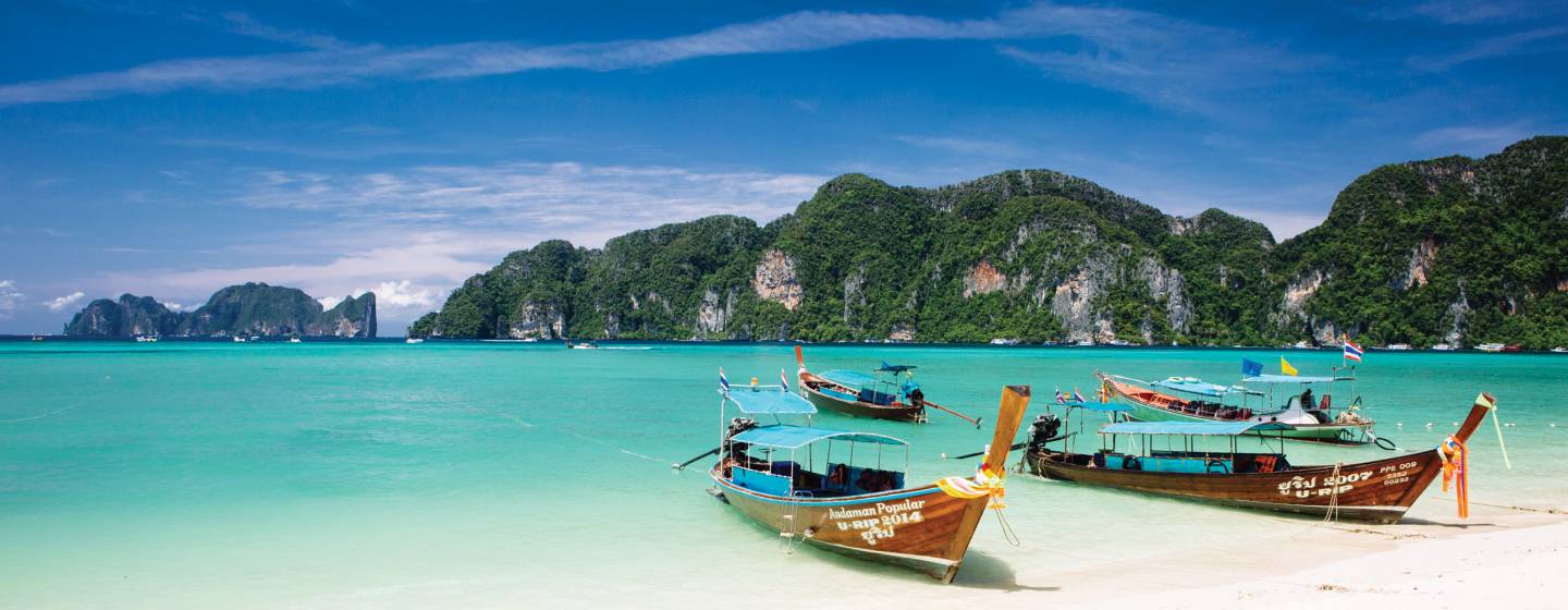 Boats anchored in sea