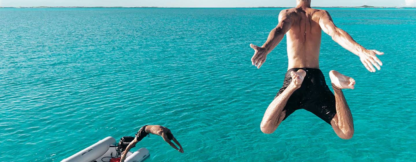 Jumping in water in the Exumas