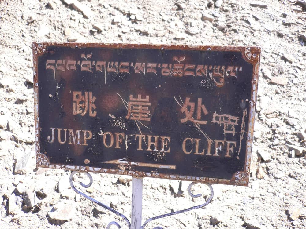 jump off the cliff sign