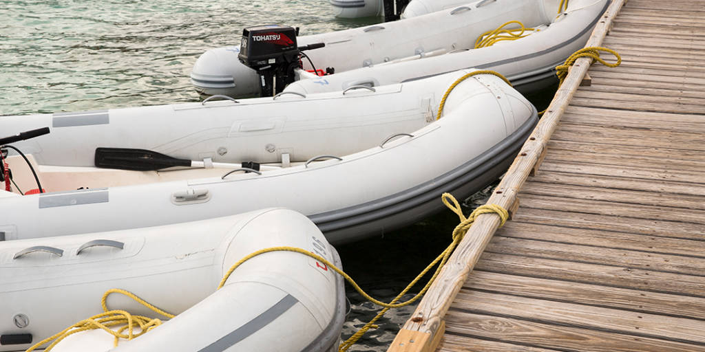 Boats tied to dock