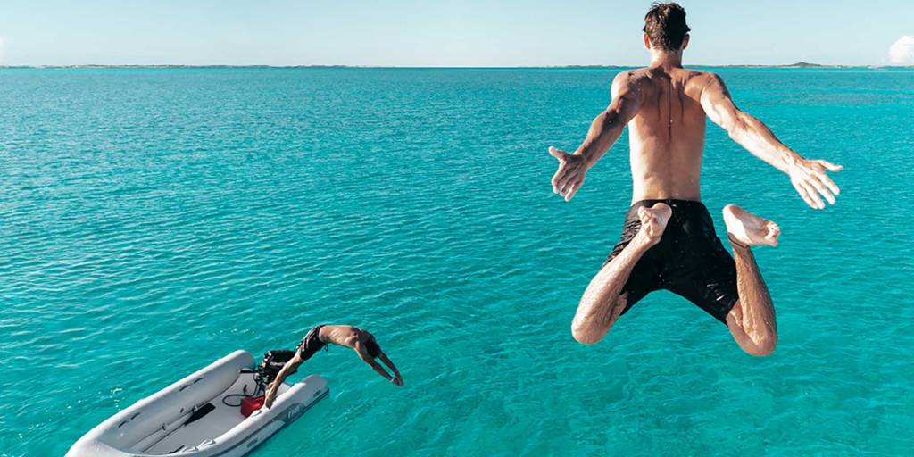 Jumping in water in the Exumas