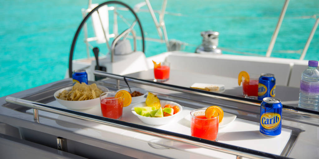 Onboard snacks Carib Beer, Juice, Fruit and Chips