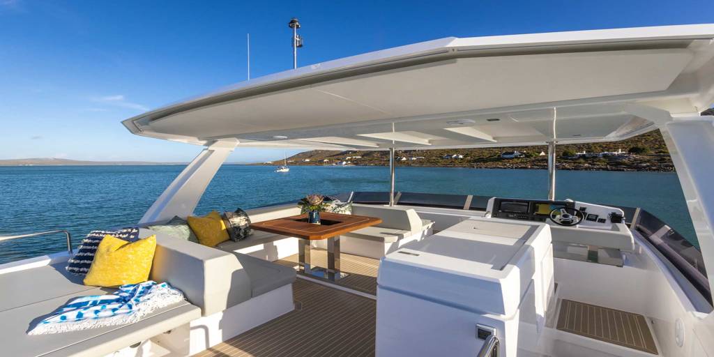 Helm and flybridge of a Moorings catamaran