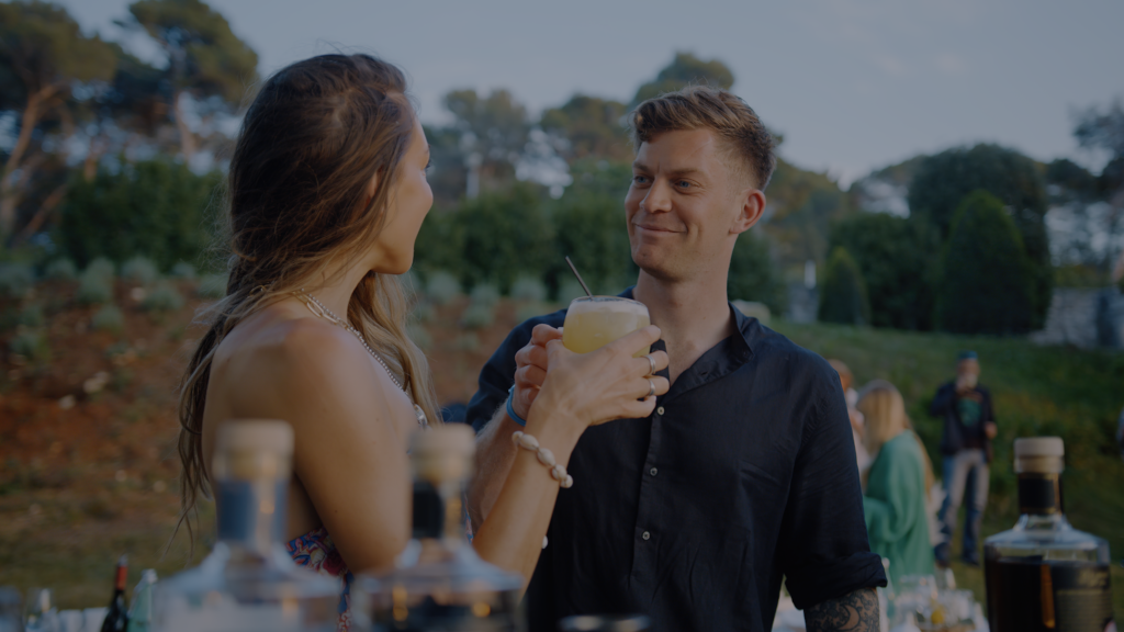 Couple enjoying drinks in Agana, Croatia 