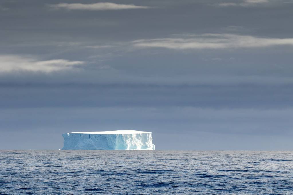 A tabular iceberg stands out in the Drake Passage.