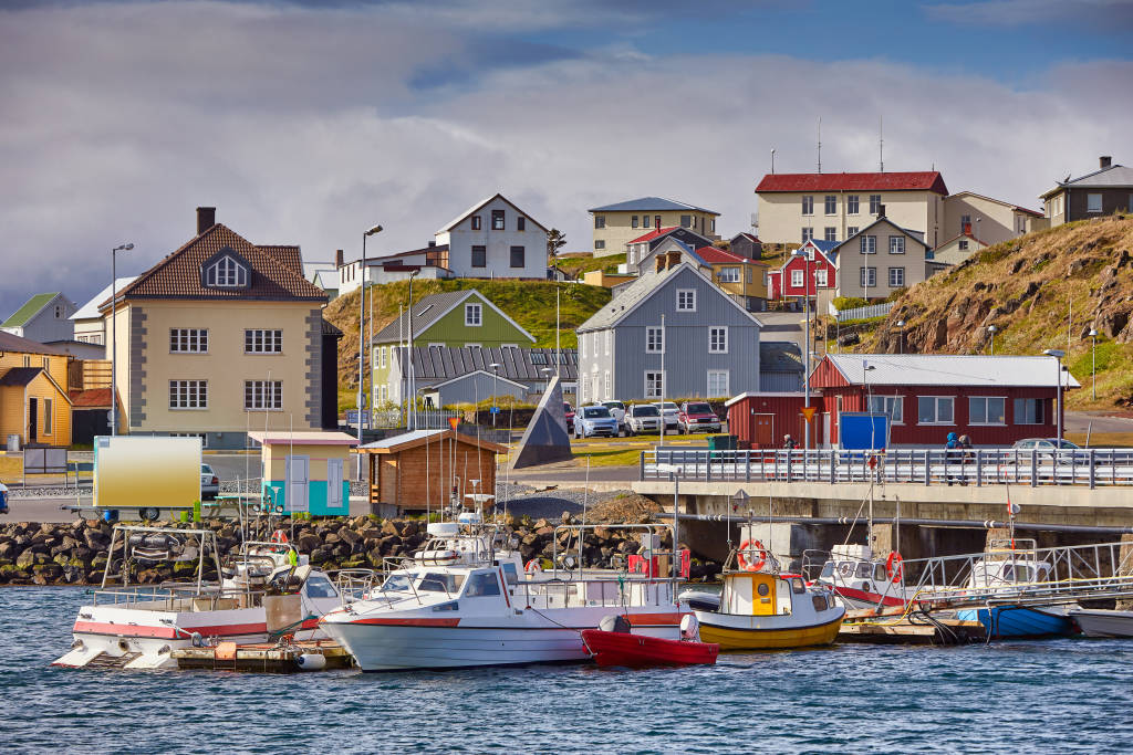 Beautiful panoramic view of the Stykkisholmskirkja Harbor with Fishing ships (boats) at Stykkisholmur town in western Iceland.