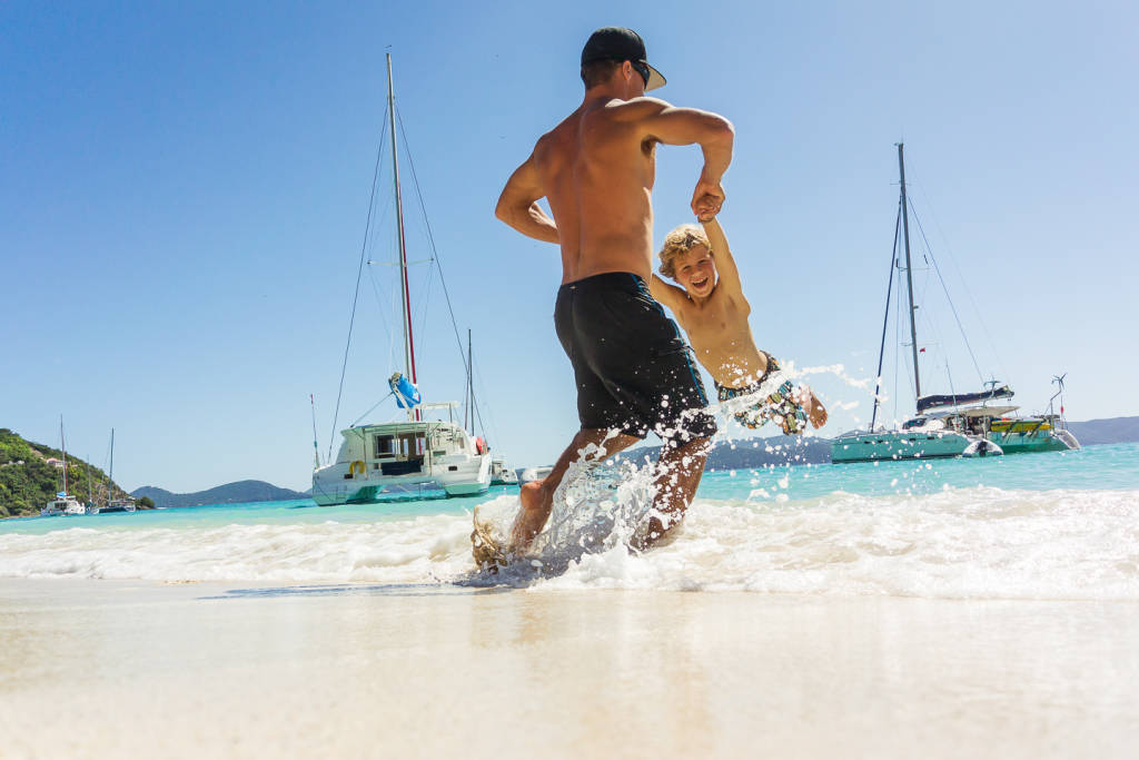 dad and child on beach 