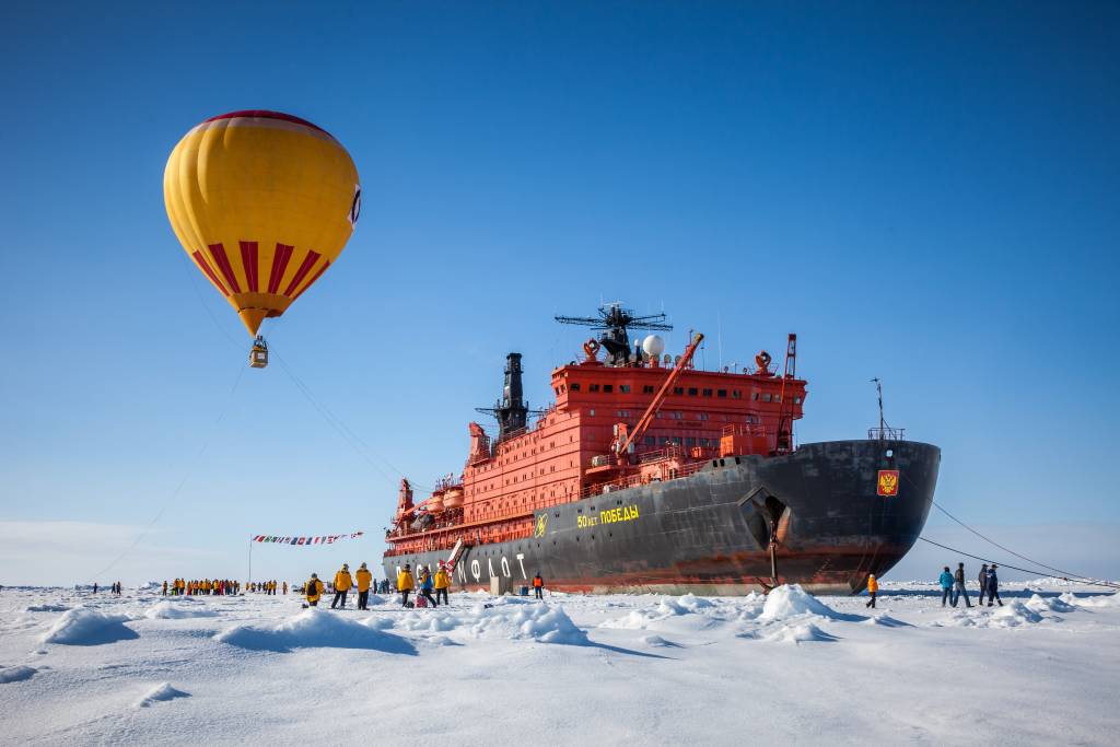 Passengers enjoy a hot air balloon rode over 50 Years of Victory at the North Pole.